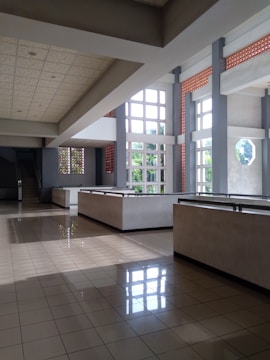 Spacious commercial space with large windows and natural light.