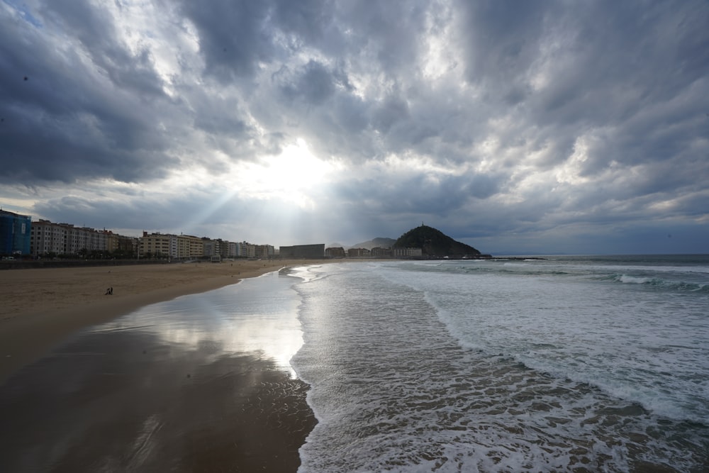 a beach that has some waves in it