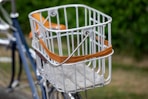 a close up of a bicycle with a basket