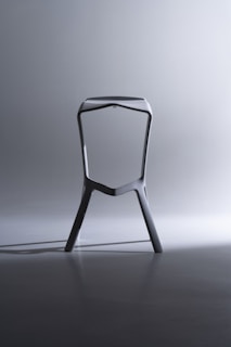 a chair that is sitting in the middle of a floor