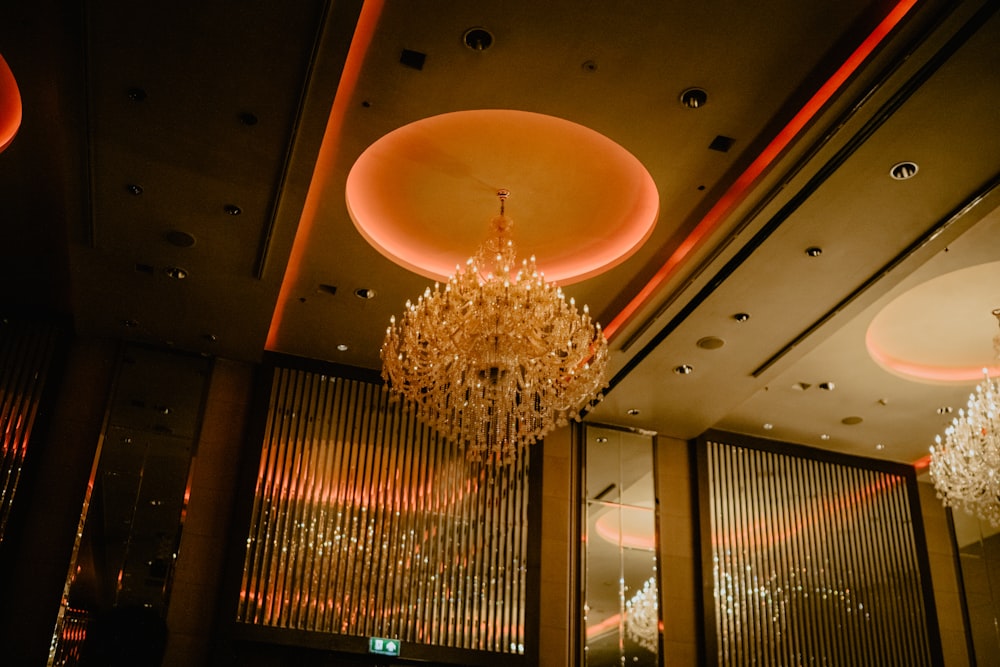 a chandelier hanging from the ceiling of a restaurant