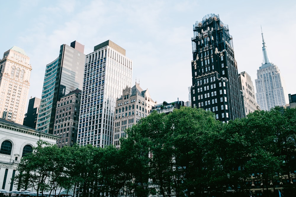 a group of tall buildings in a city