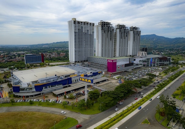 an aerial view of a city with tall buildings