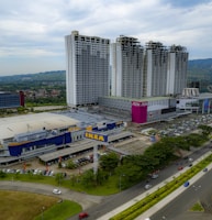 an aerial view of a city with tall buildings