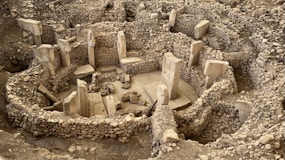 an aerial view of the ruins of a roman city