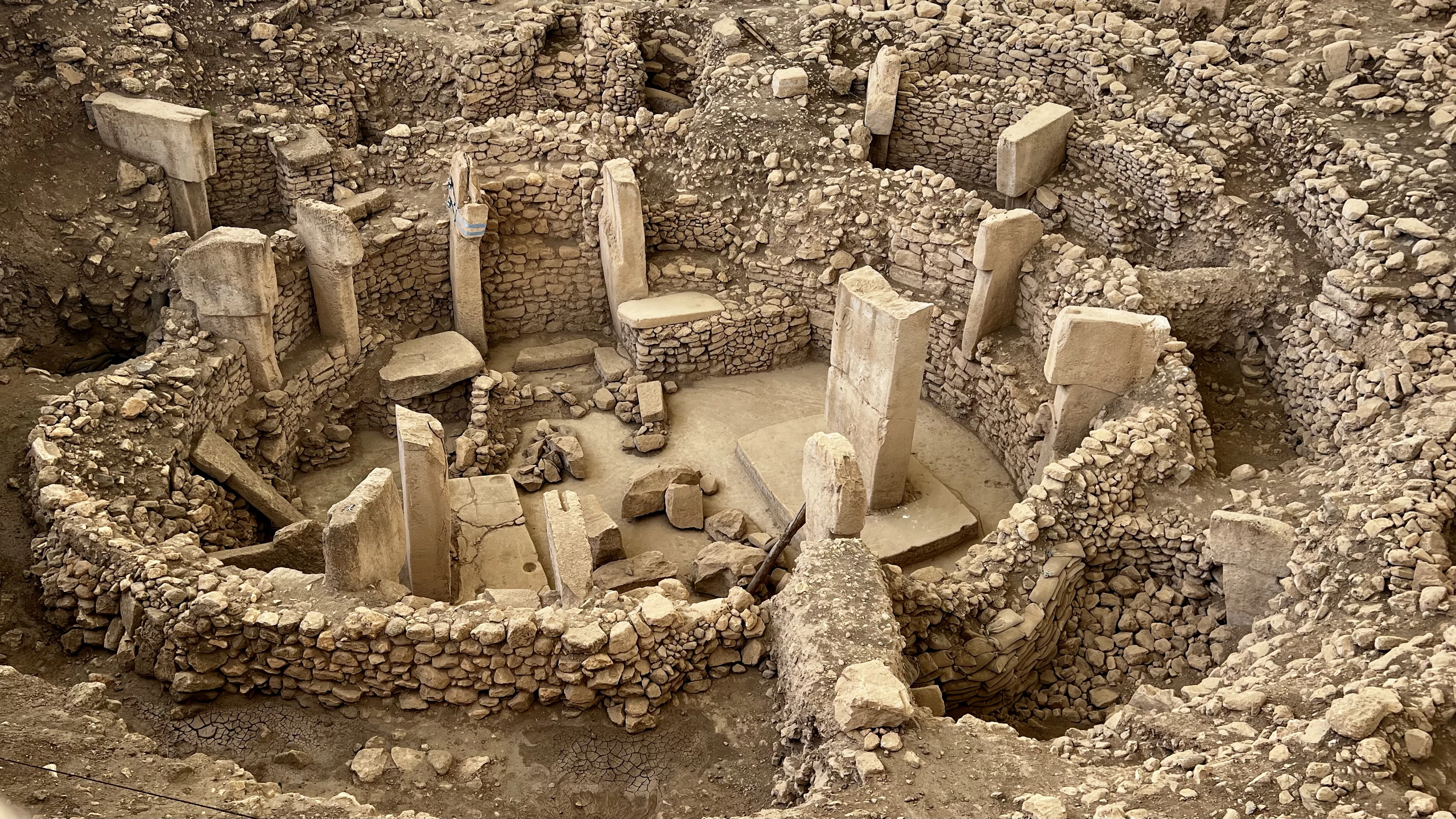 The stone enclosures of Göbekli Tepe with their T-shaped pillars, seen from above