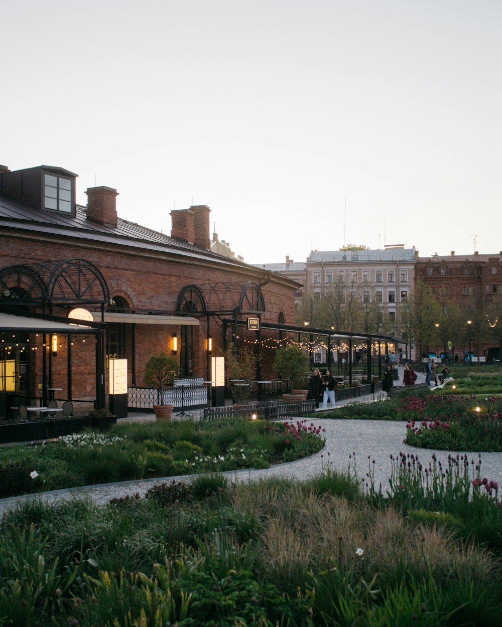 a building with a garden in front of it