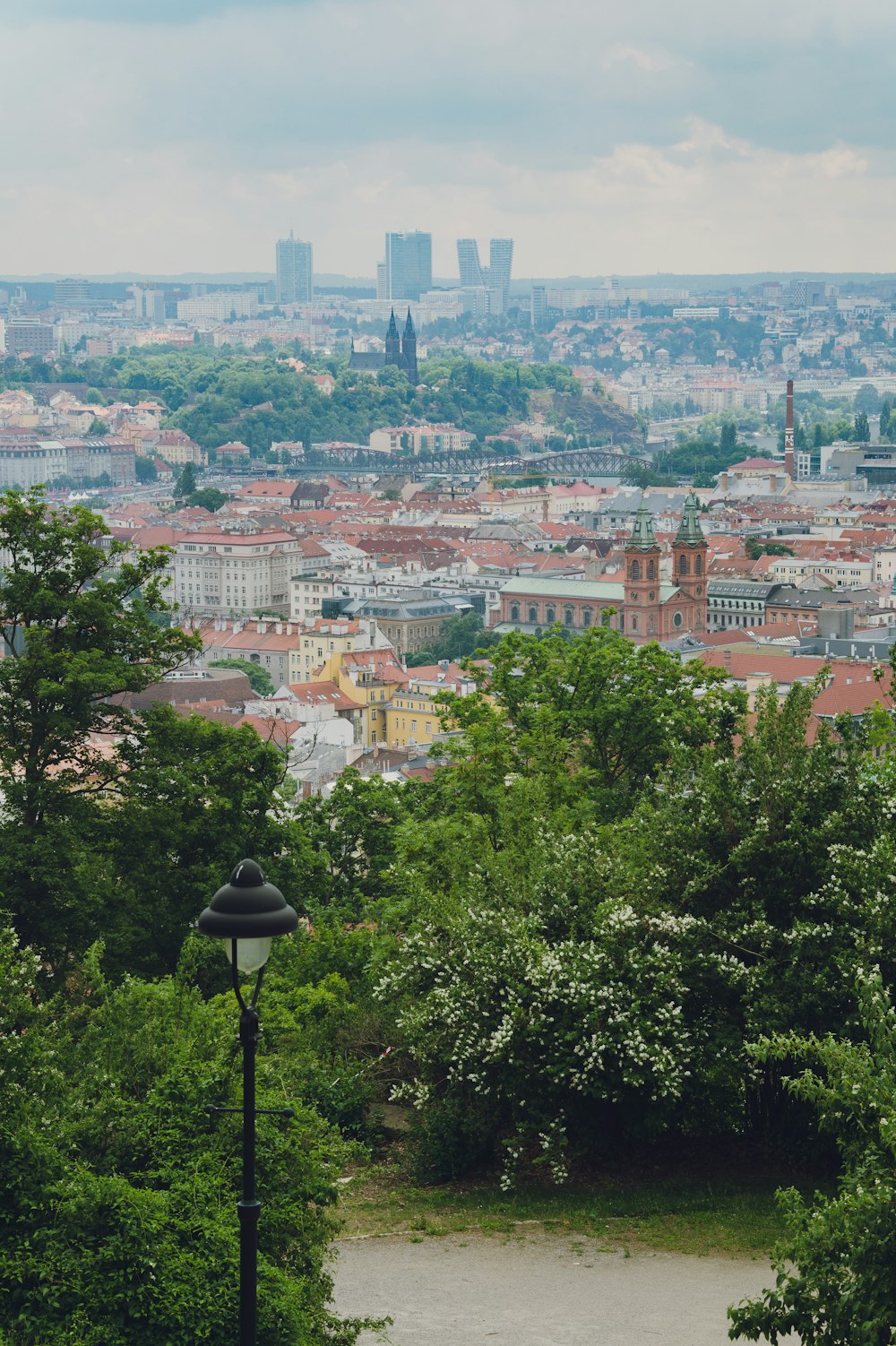 a view of a city from the top of a hill