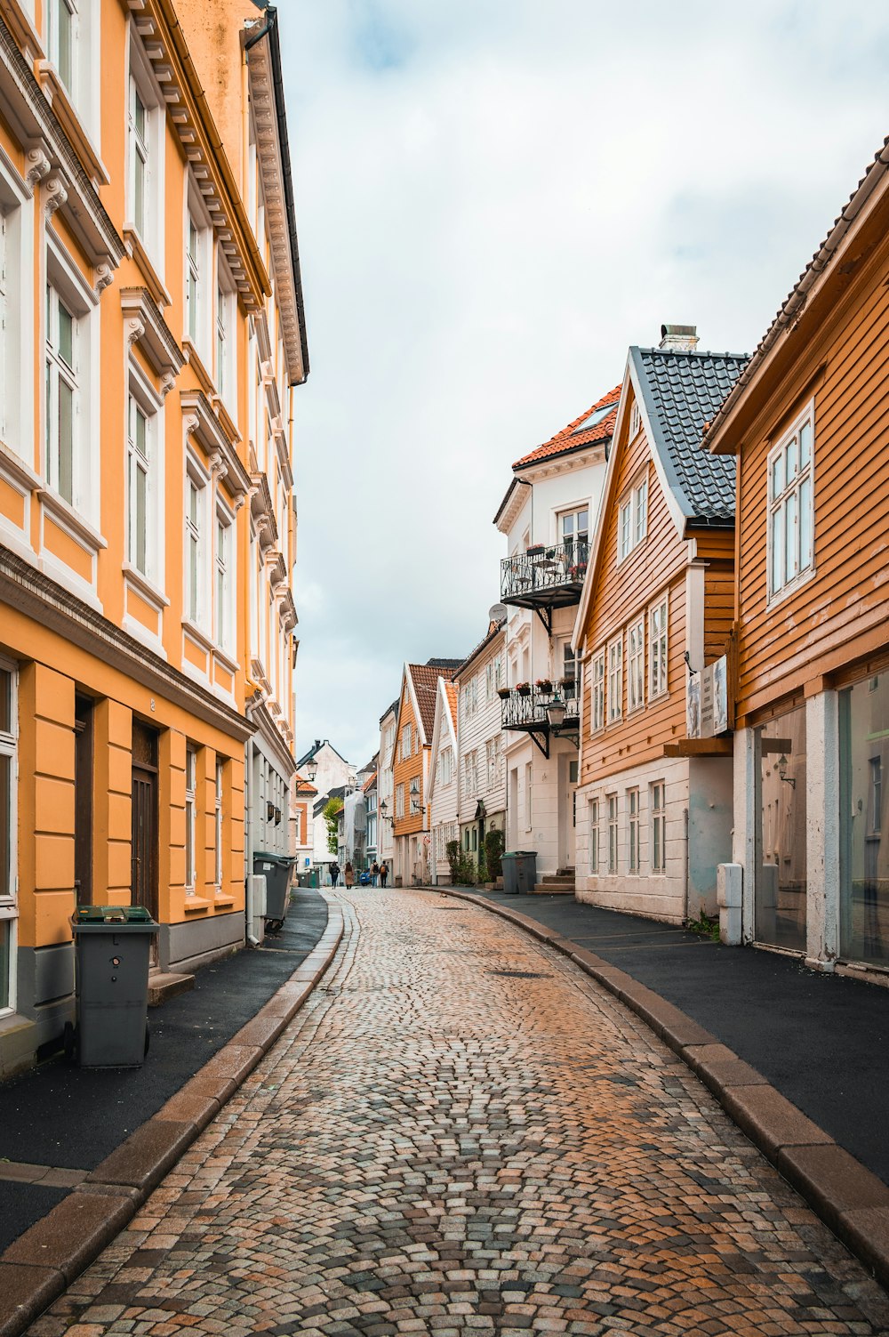 a cobblestone street in a european city