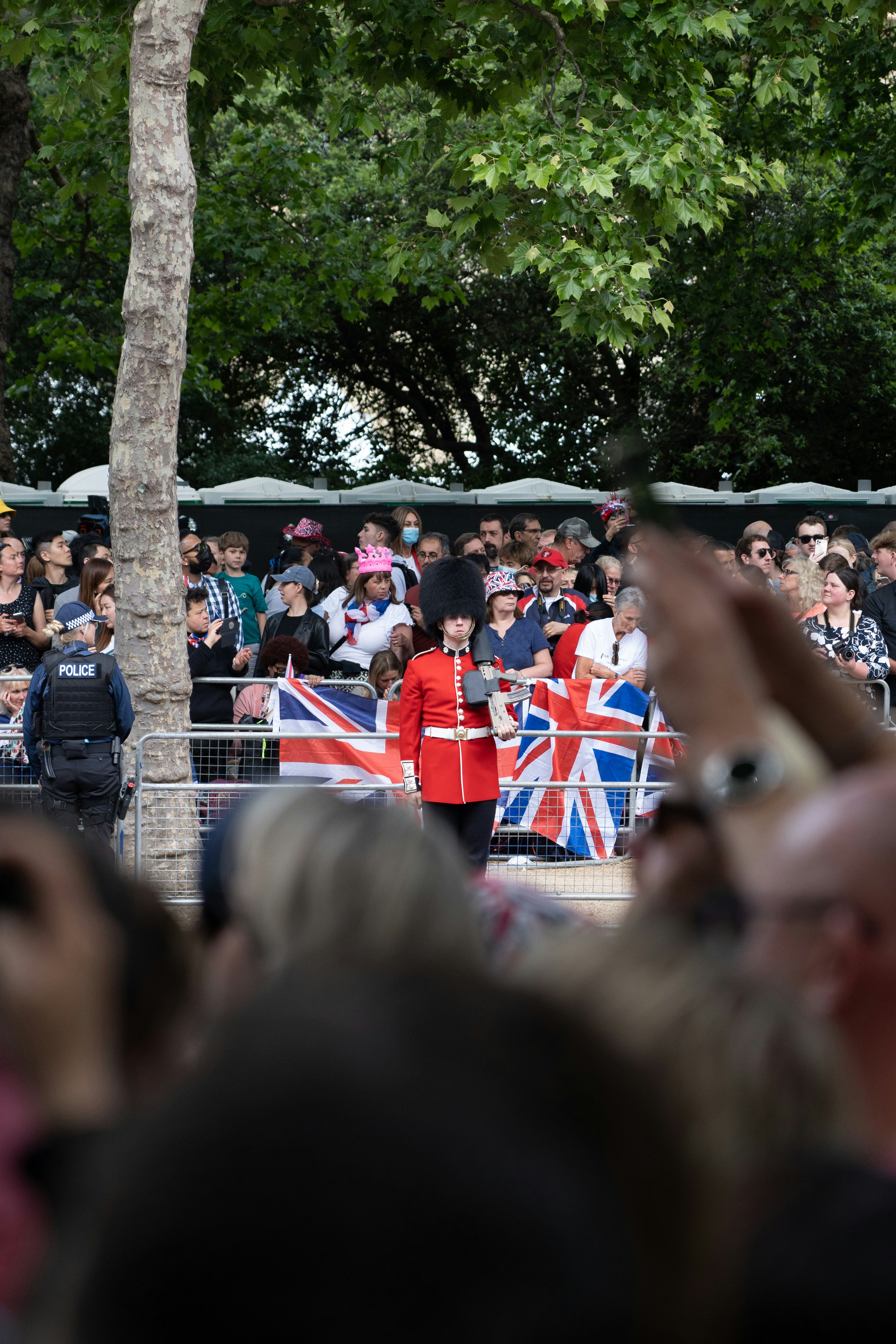 a crowd of people standing next to each other