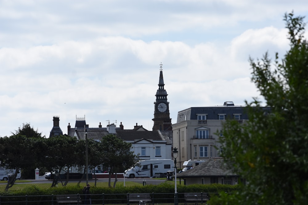 a large clock tower towering over a city