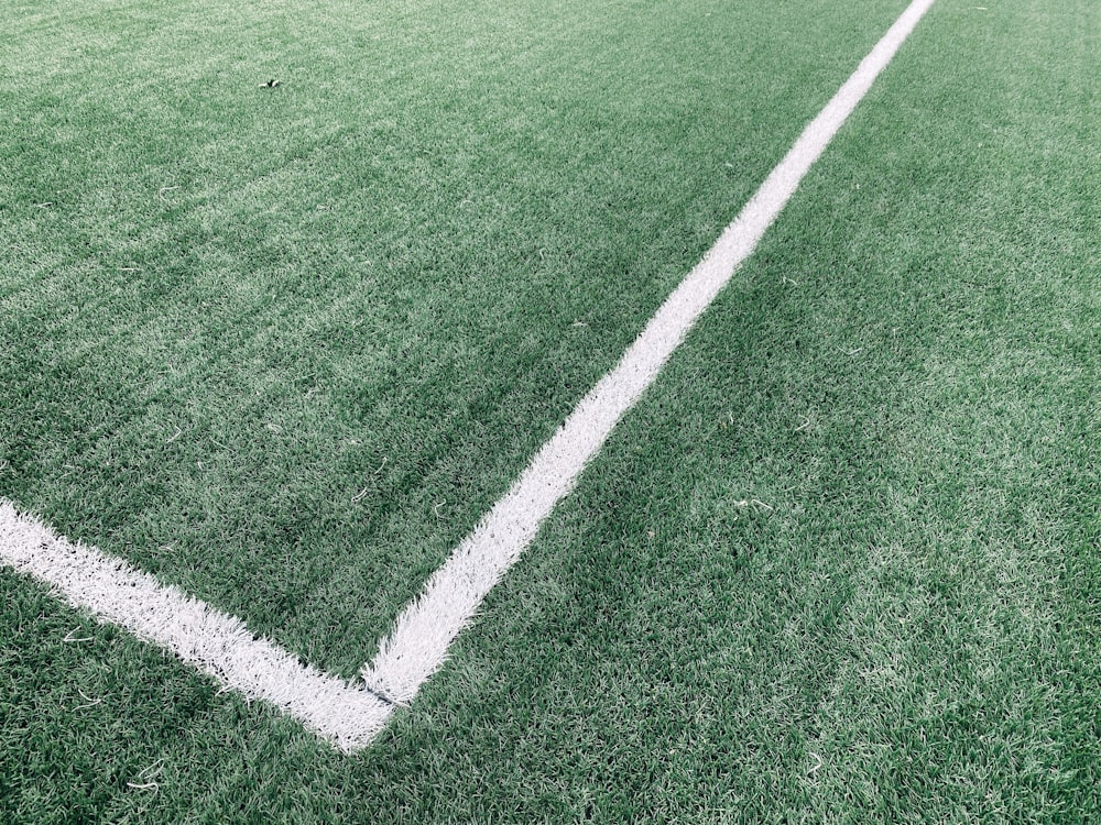 a soccer field with a white line painted on it