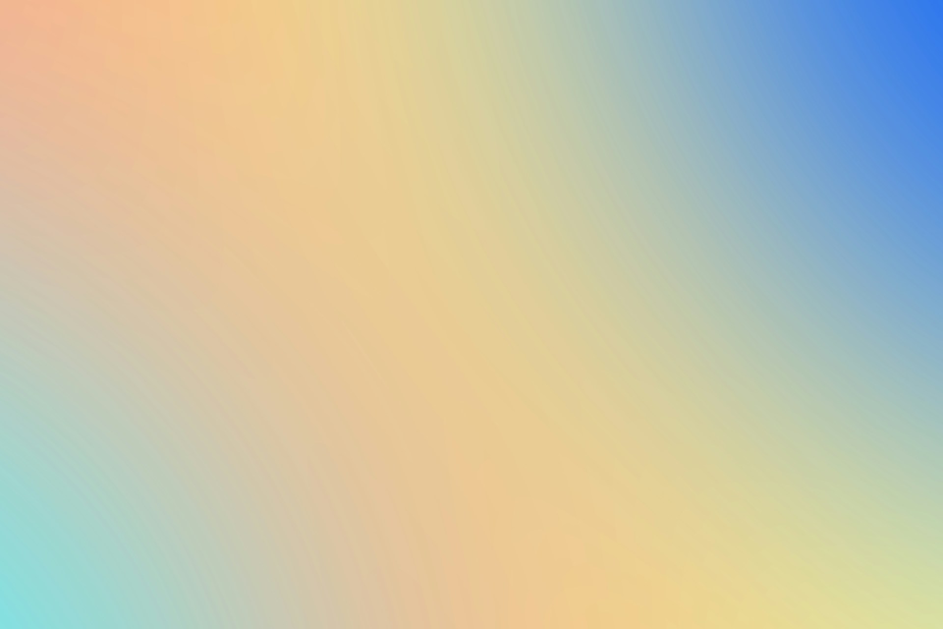 a blurry image of a rainbow colored background