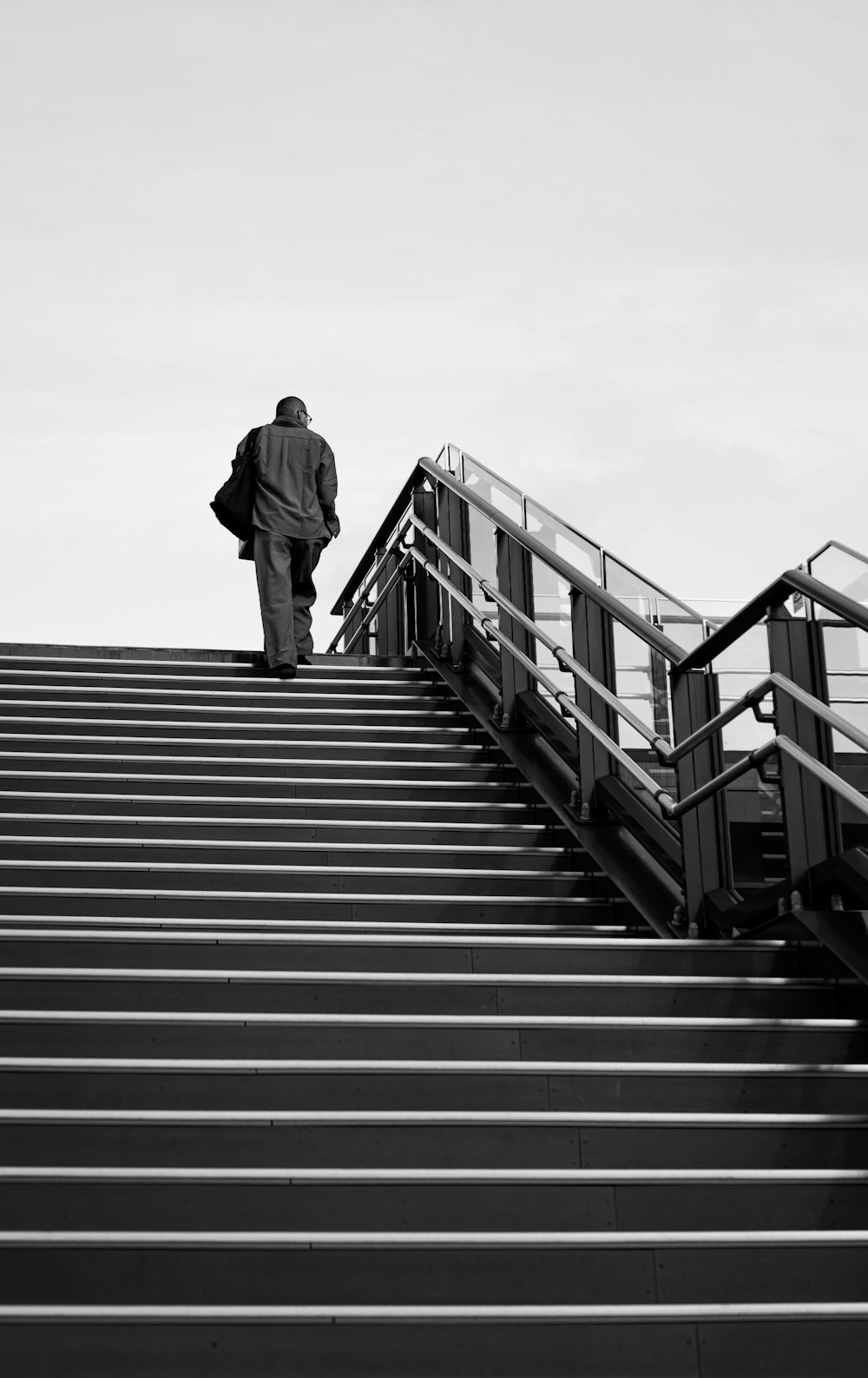 a man walking up a flight of stairs