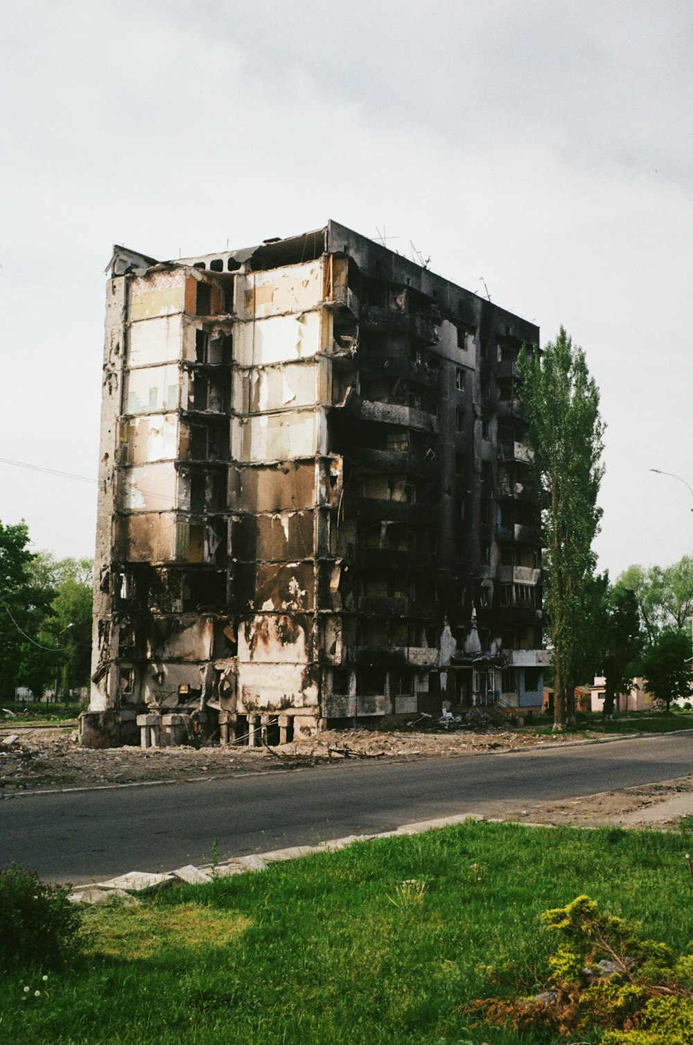 a large building sitting on the side of a road