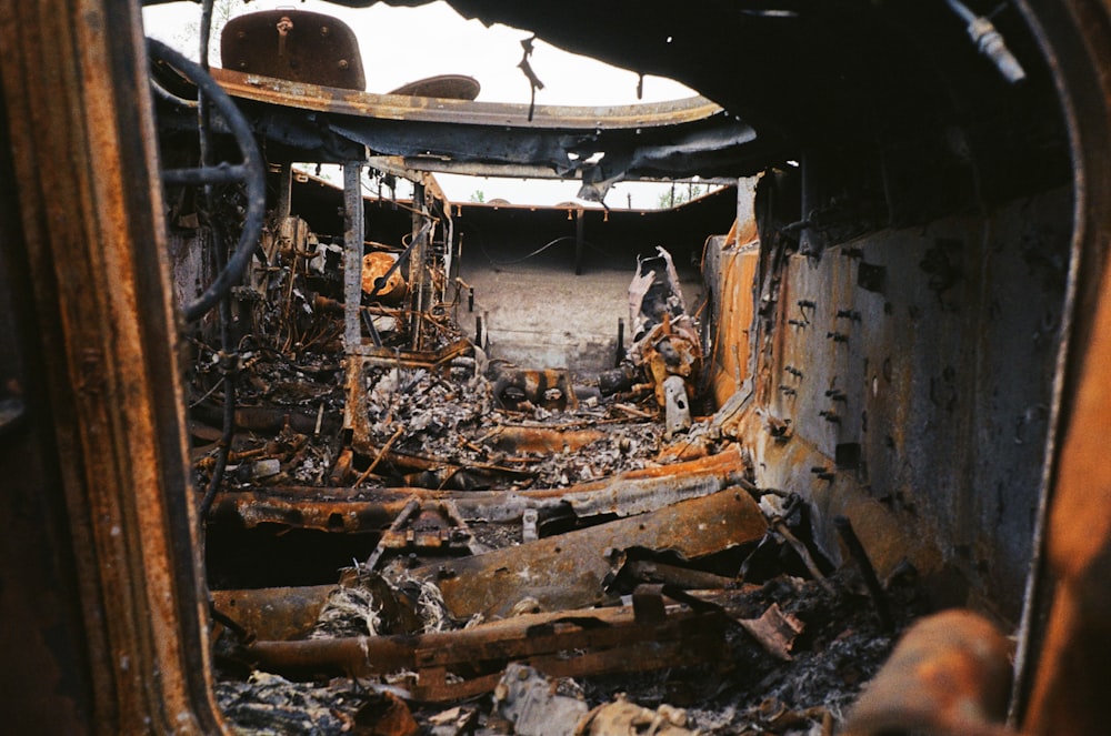 a burnt out building with a bunch of debris