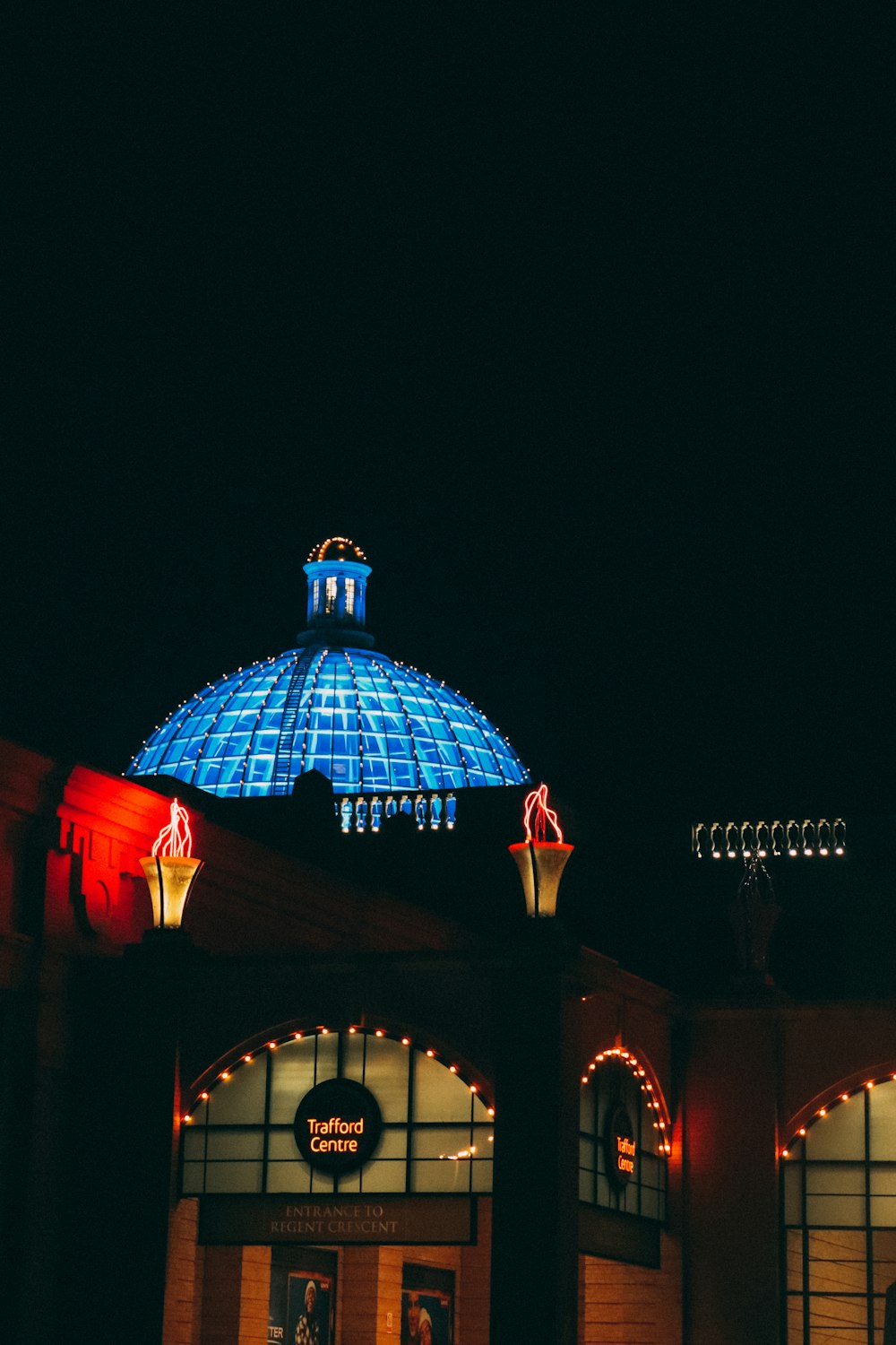 a building with a lit up dome on top of it