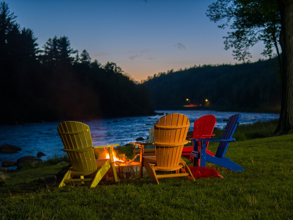 a group of chairs sitting around a fire pit