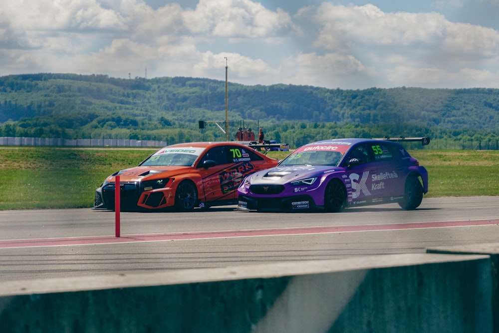 a couple of cars that are on a track