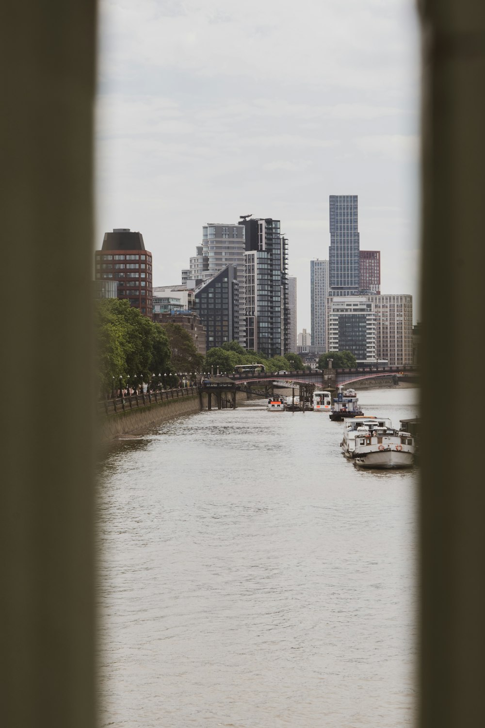 a view of a body of water with a city in the background