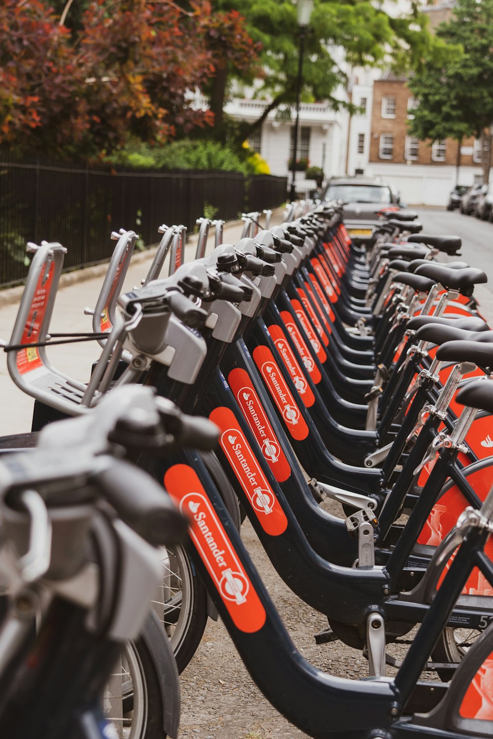 a row of bikes parked next to each other