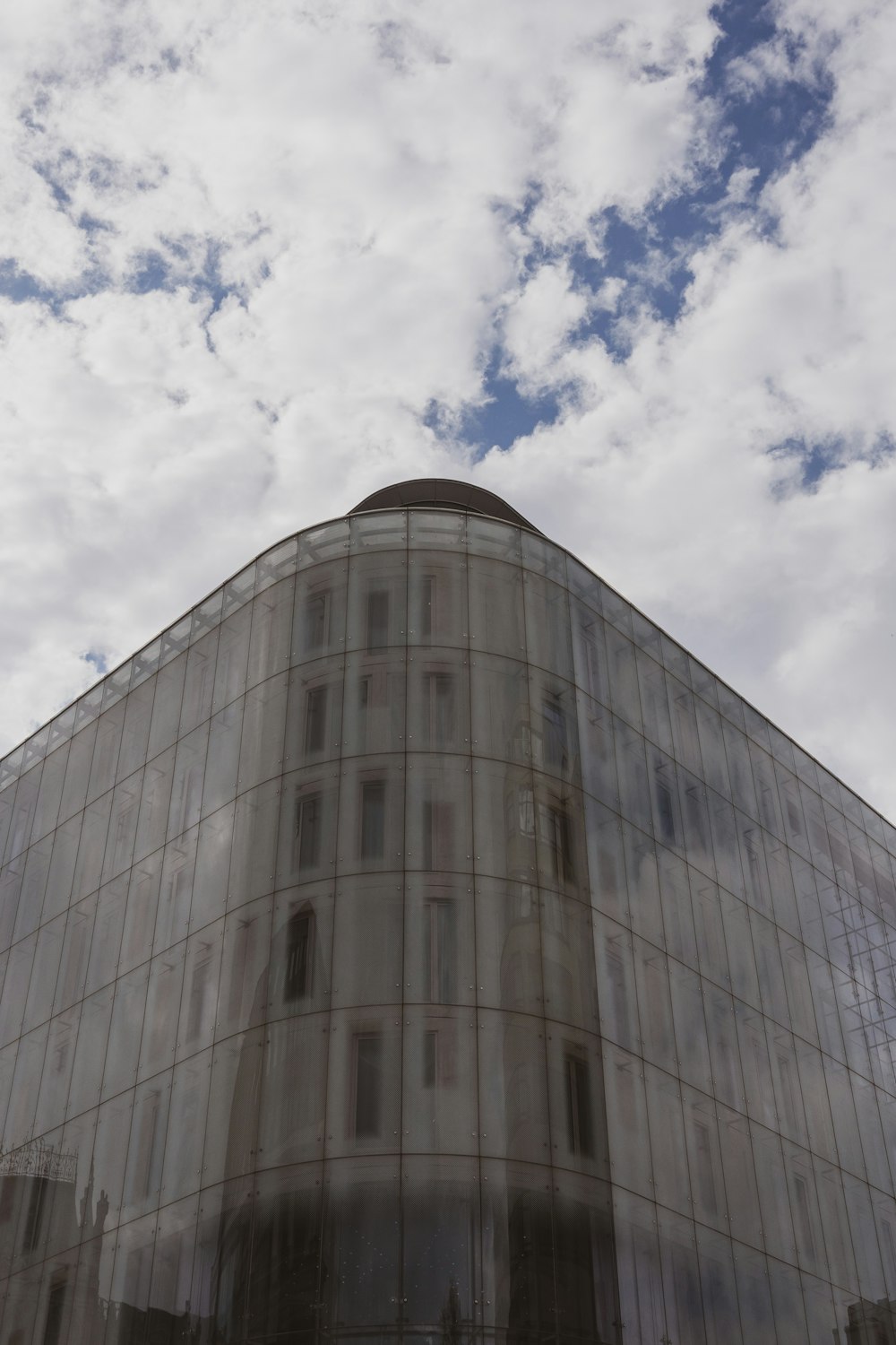 a tall building with a lot of windows on top of it