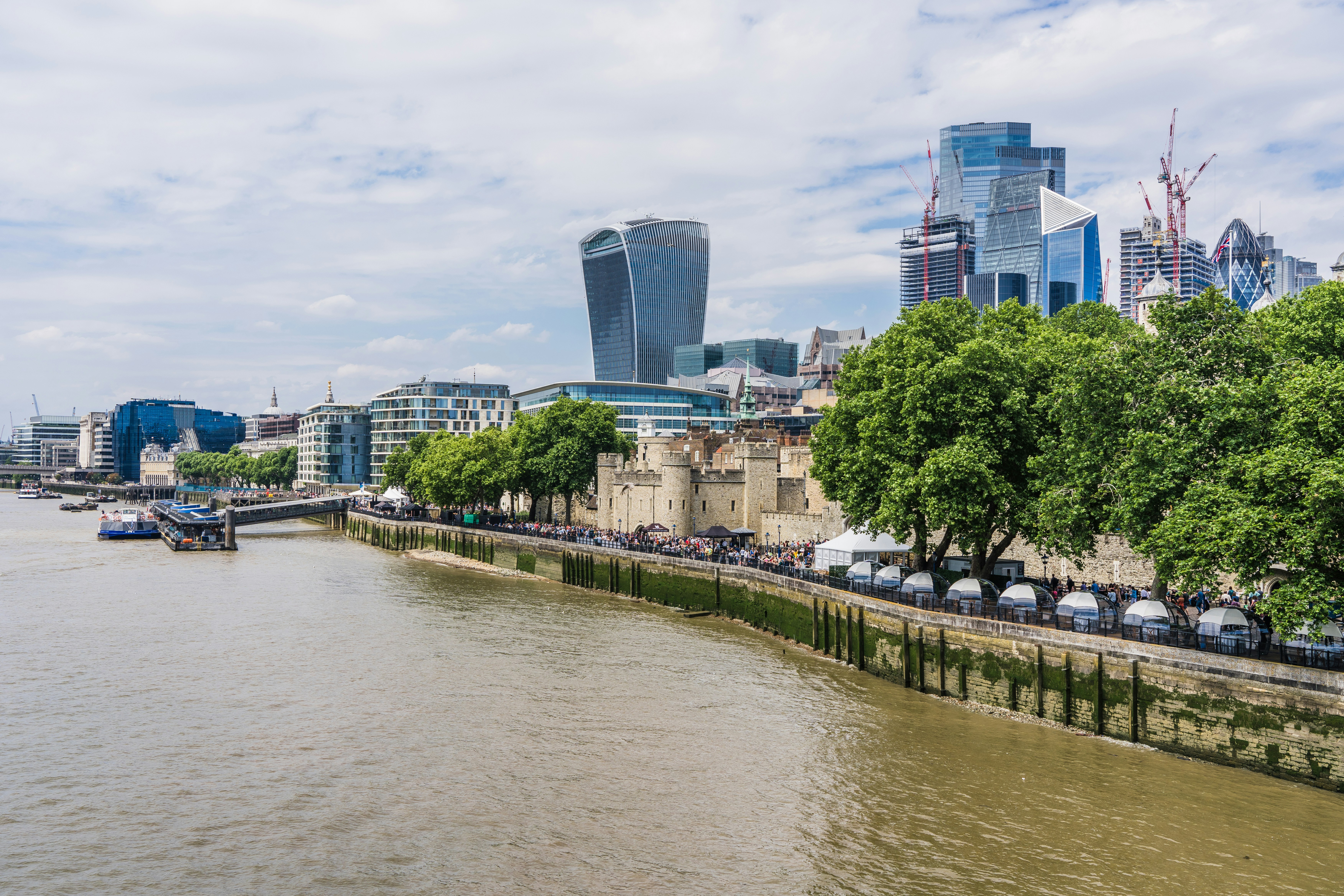 a view of a river with a city in the background