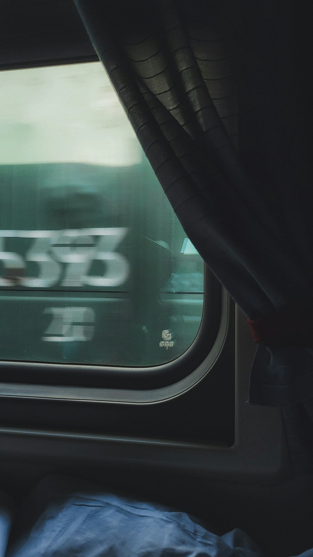 a view of a train from inside a vehicle