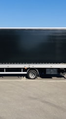 a large truck parked on the side of the road