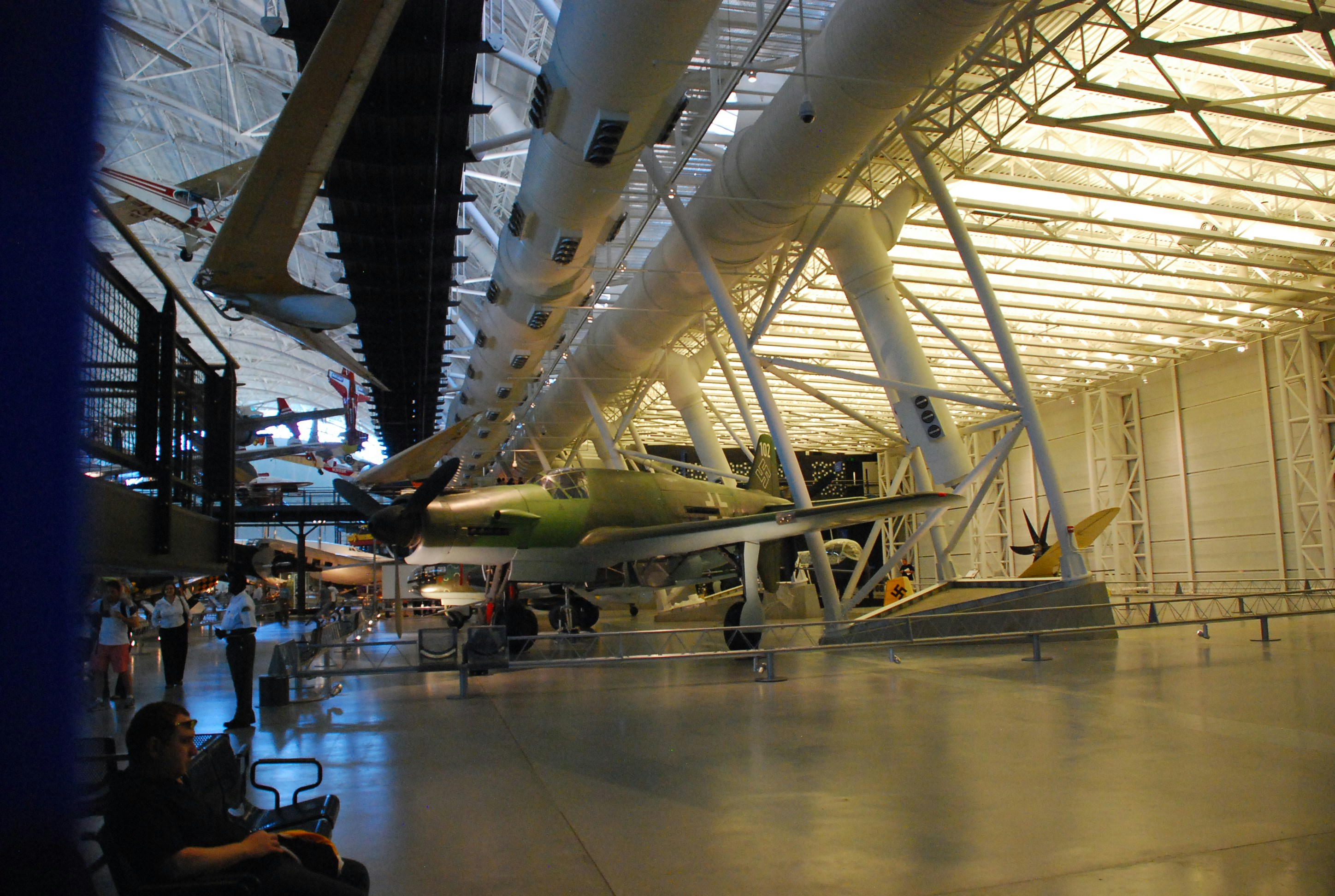 an airplane is parked inside of a hangar