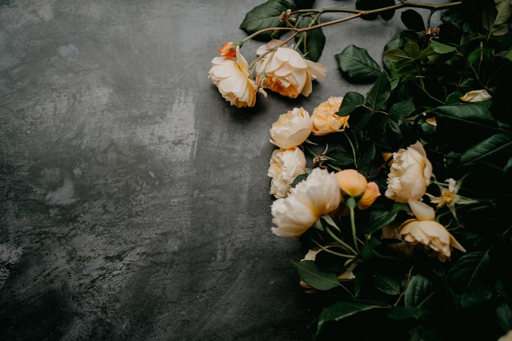 a bunch of flowers that are on a table