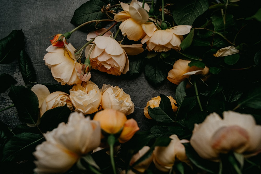 a bunch of flowers that are on a table