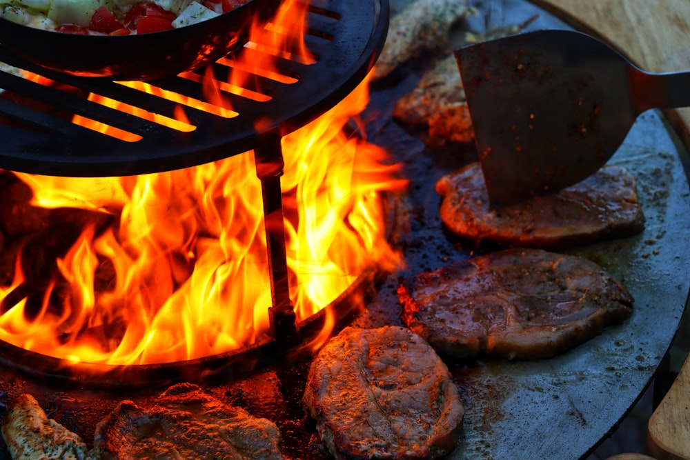 a close up of a grill with food on it