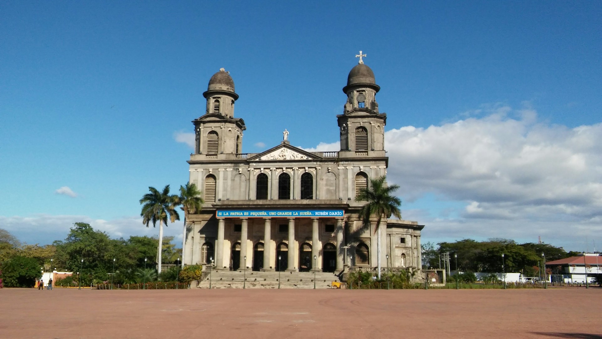 a large building with two towers on top of it
