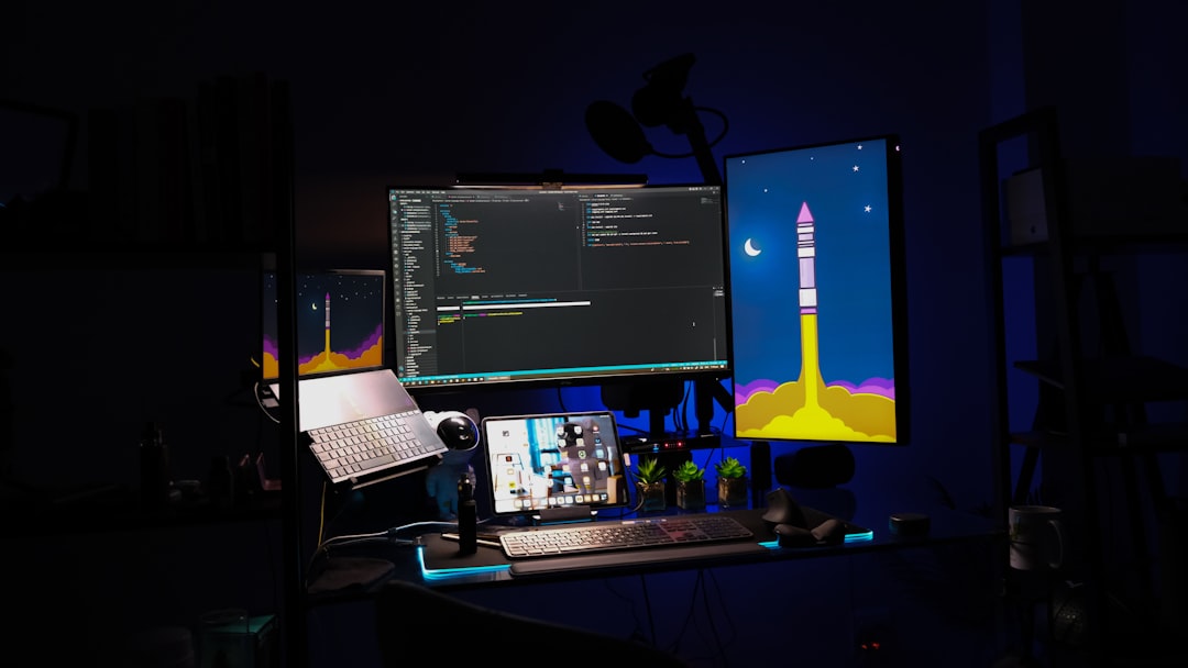 a computer desk with a monitor and keyboard, Workspace