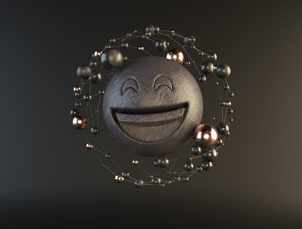 a ball with a smiley face surrounded by balls