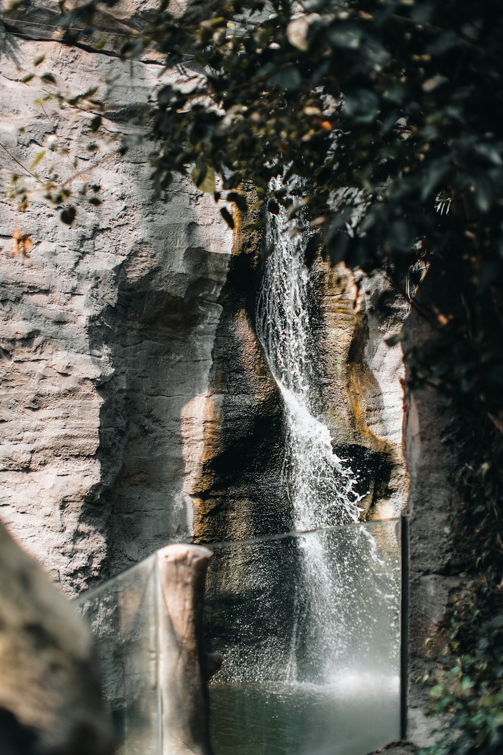 a waterfall with water coming out of it