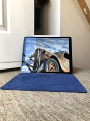 Screenshot of a step-by-step repair video playing on a tablet.