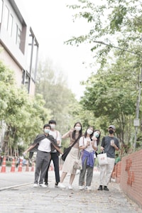 a group of people standing next to each other