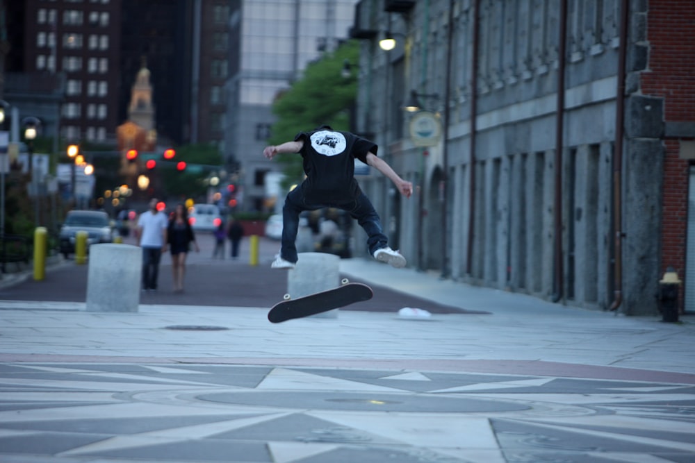 a man flying through the air while riding a skateboard