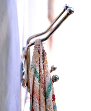 a close up of a towel hanging on a hook