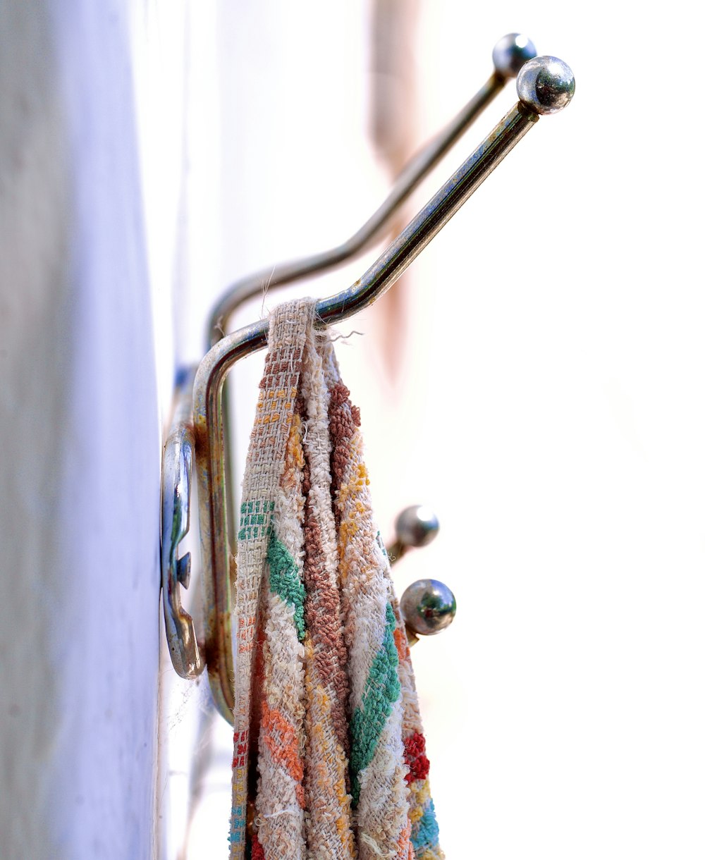 a close up of a towel hanging on a hook