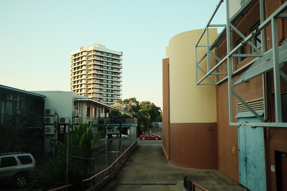 a view of a city street with a building in the background