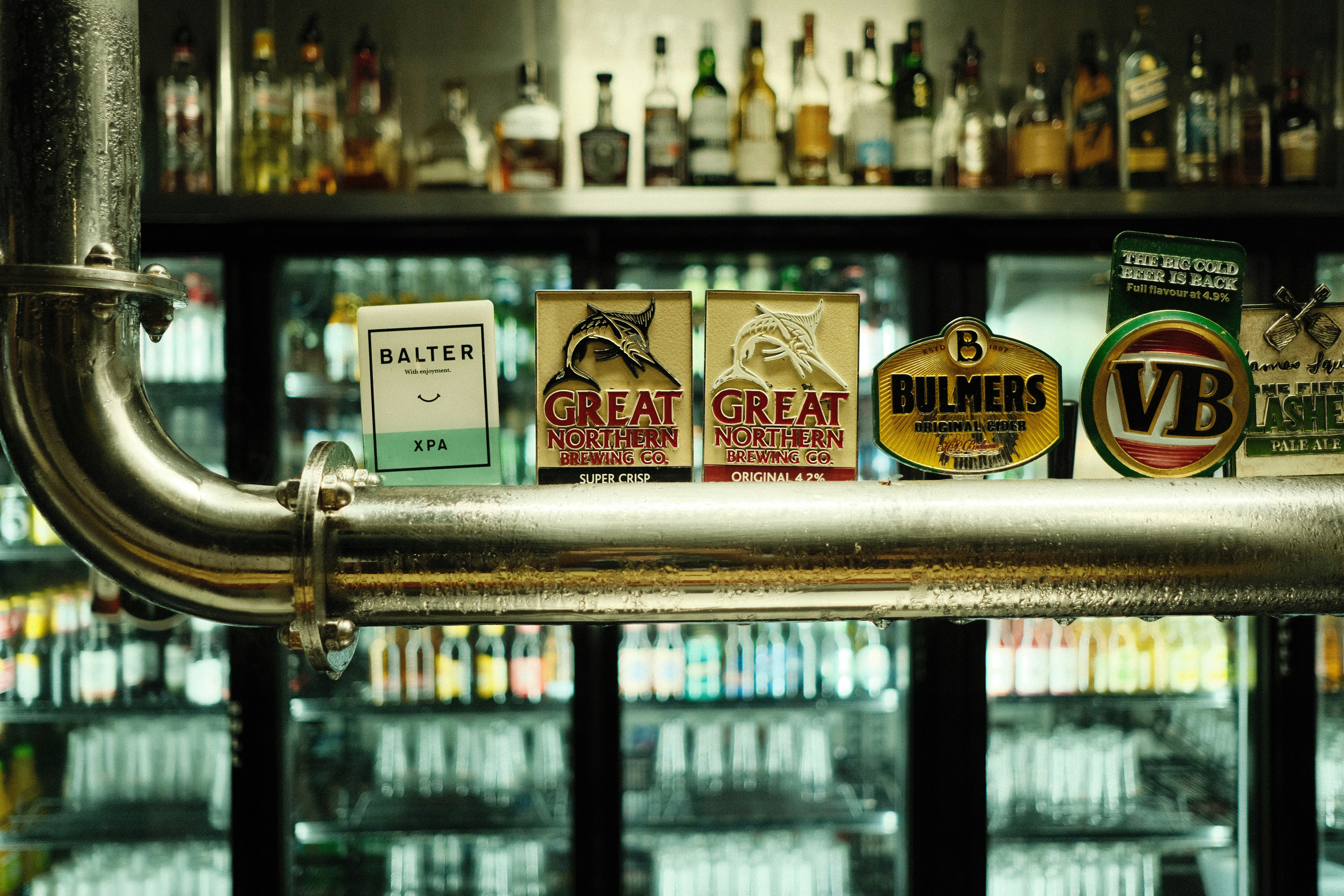 a bar with a bunch of different types of beer