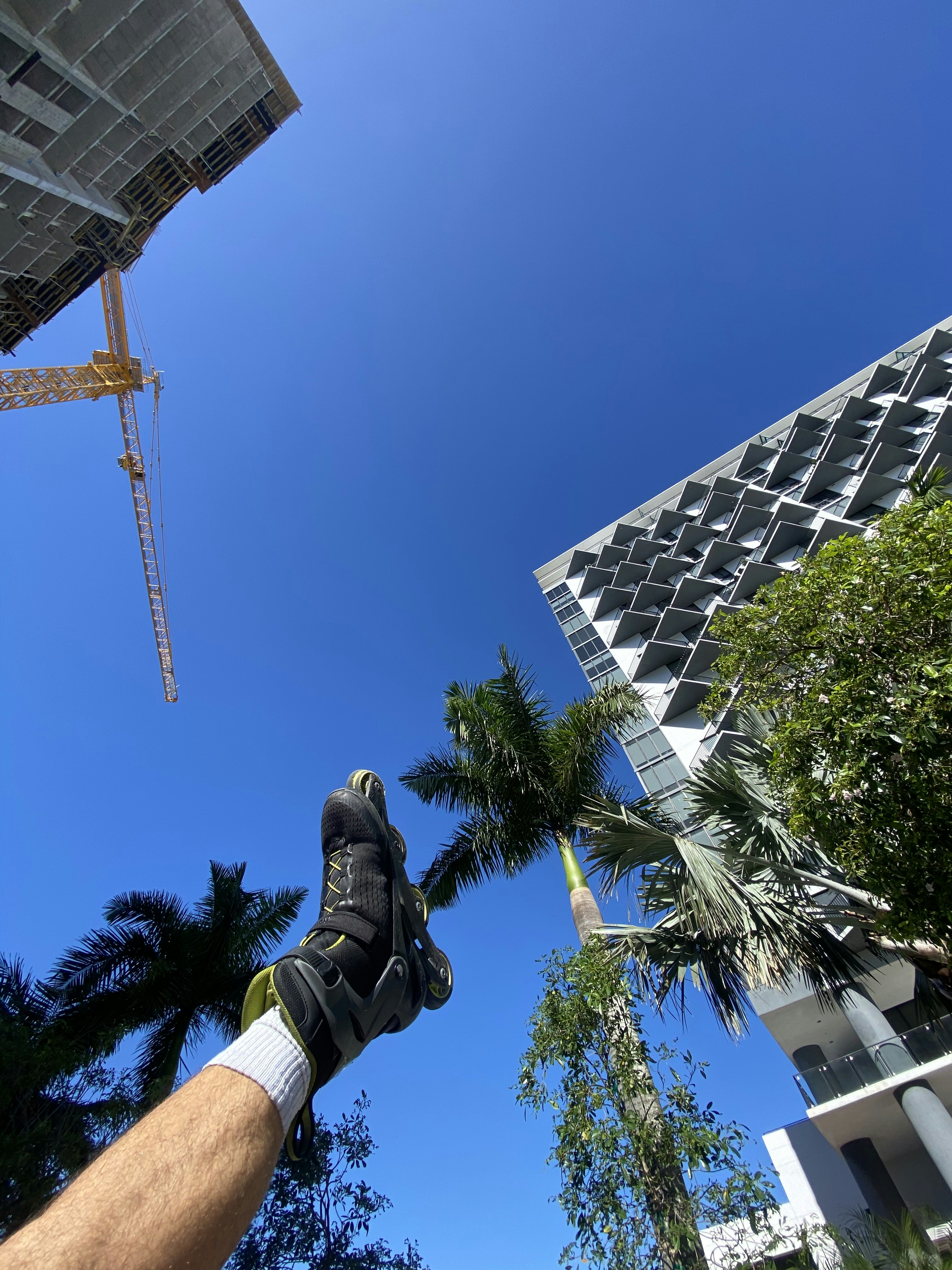 a man is holding his glove up in the air