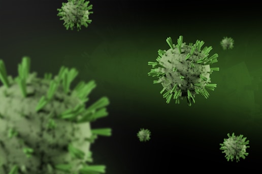 Close-up illustration of virus-like particles designed for vaccine development under a microscope.