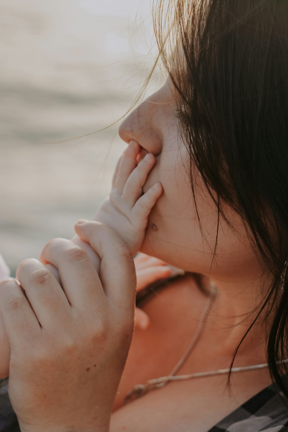 a close up of a person holding a cell phone