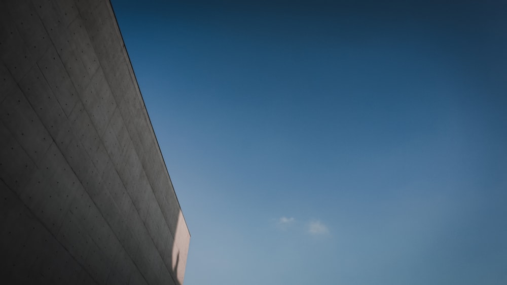 a tall building with a clock on the side of it