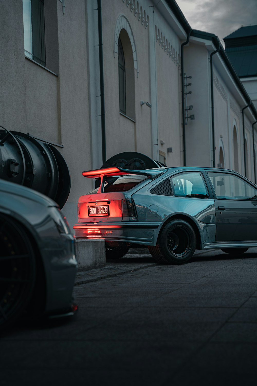 a car is parked in front of a building