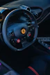 a close up of a steering wheel in a car